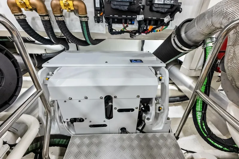 Fantasy Girl Yacht Photos Pics Engine room of 2025 Absolute 75 Navetta yacht with advanced machinery and piping.