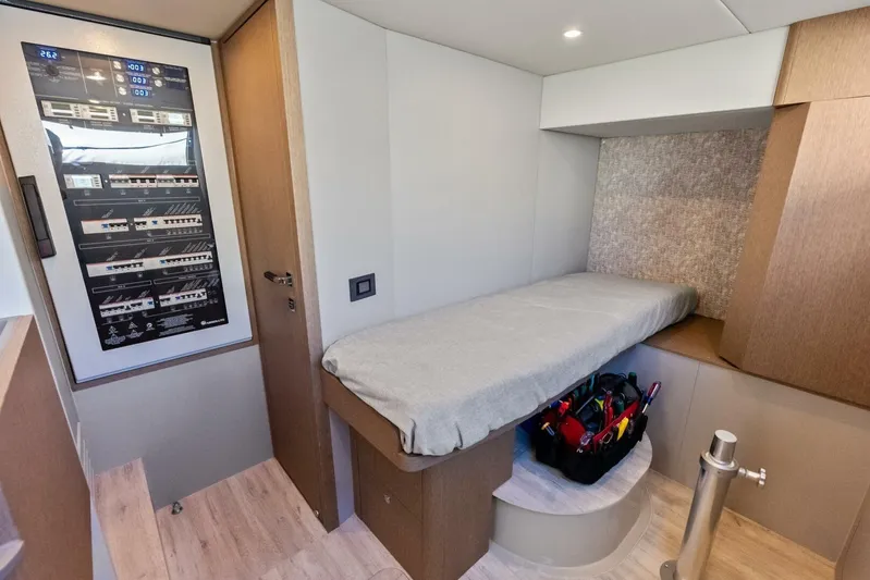 Fantasy Girl Yacht Photos Pics 2025 Absolute 75 Navetta interior cabin with single bed and control panel.