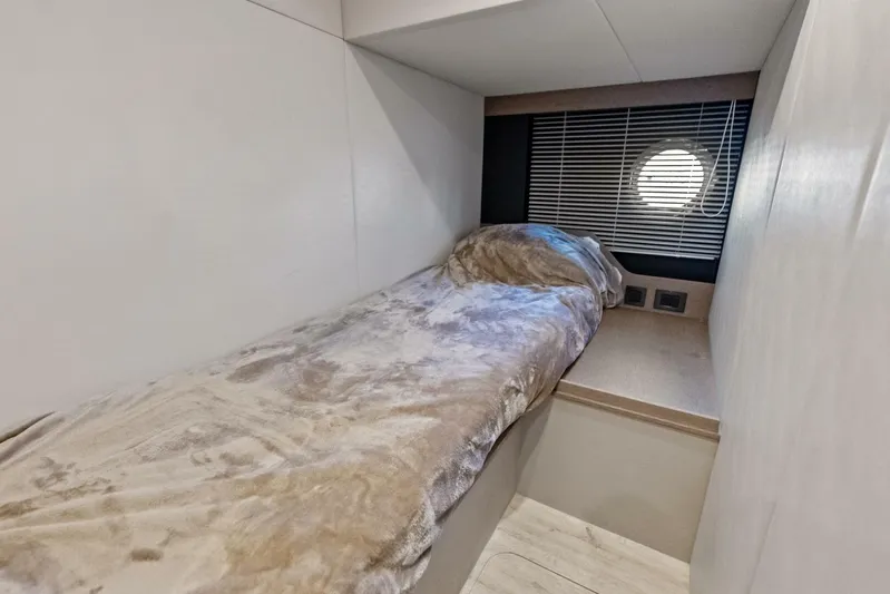 Fantasy Girl Yacht Photos Pics Cozy cabin bed in 2025 Absolute 75 Navetta yacht with porthole and blinds.