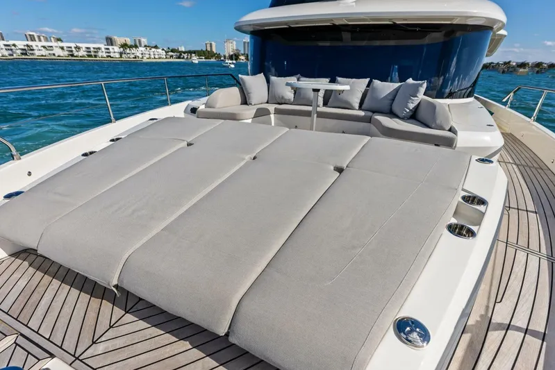Fantasy Girl Yacht Photos Pics Luxurious 2025 Absolute 75 Navetta yacht with spacious sunbathing deck and elegant seating area.