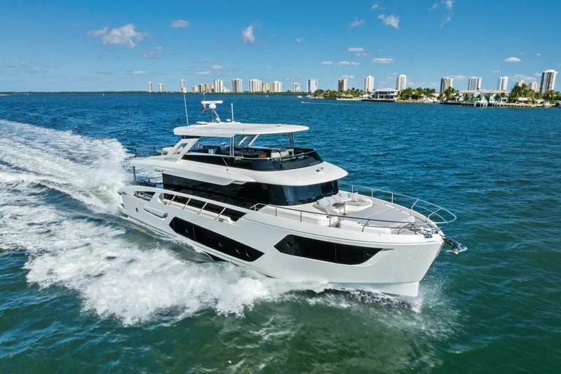 Fantasy Girl Yacht Photos Pics Luxury Absolute 75 Navetta yacht cruising on blue ocean, 2025 model.