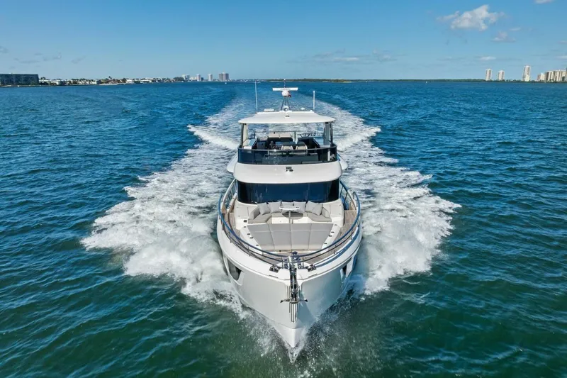 Fantasy Girl Yacht Photos Pics Luxury Absolute 75 Navetta yacht cruising on open water, 2025 model.