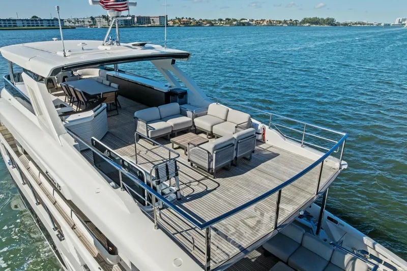 Fantasy Girl Yacht Photos Pics Luxurious 2025 Absolute 75 Navetta yacht with spacious deck and elegant seating.