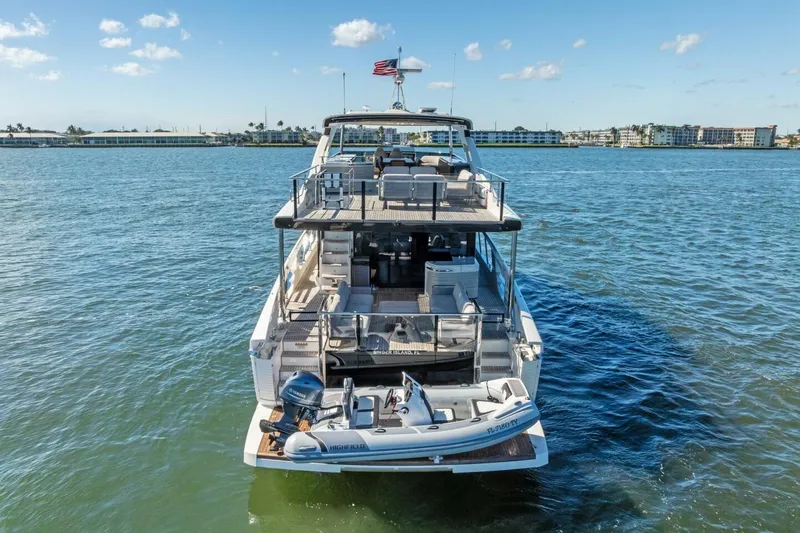 Fantasy Girl Yacht Photos Pics Luxury Absolute 75 Navetta yacht on water, 2025 model, with American flag.