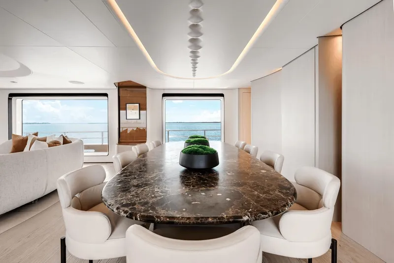  Yacht Photos Pics Luxurious interior of 2025 Azimut Grande 36M yacht with elegant dining area and ocean view.
