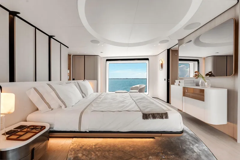  Yacht Photos Pics Luxurious bedroom interior on 2025 Azimut Grande 36M yacht with ocean view.