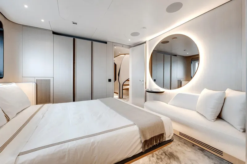  Yacht Photos Pics Luxurious bedroom interior of 2025 Azimut Grande 36M yacht with modern design and ambient lighting.