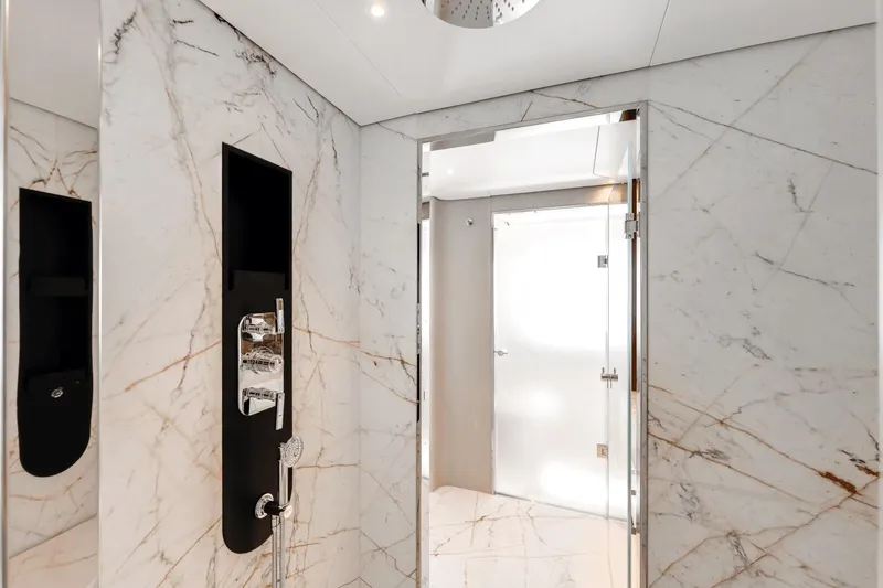  Yacht Photos Pics Luxurious marble bathroom interior on Azimut Grande 36M yacht, 2025 model.