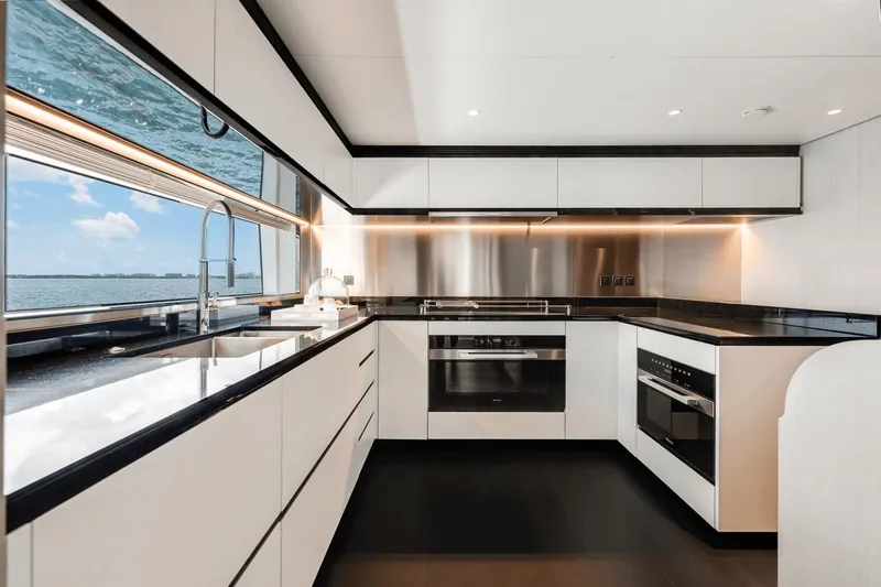  Yacht Photos Pics Luxurious kitchen interior of 2025 Azimut Grande 36M yacht with sleek design and ocean view.