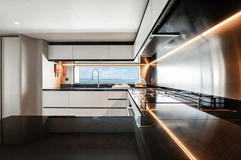  Yacht Photos Pics Modern kitchen interior on 2025 Azimut Grande 36M yacht, featuring sleek design and ocean view.