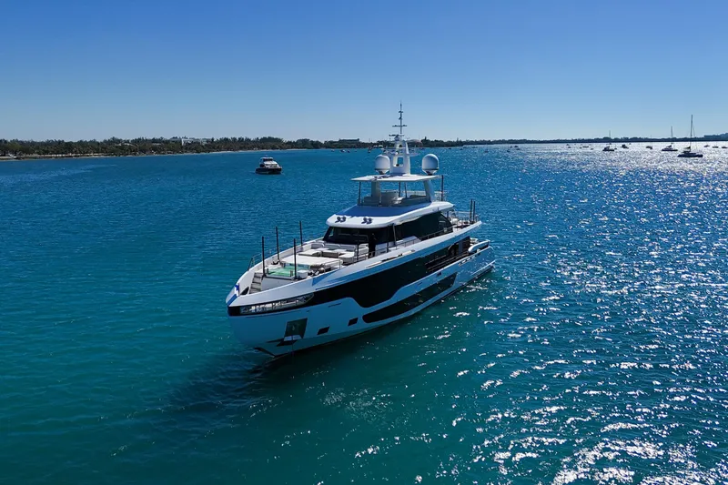  Yacht Photos Pics Luxurious 2025 Azimut Grande 36M yacht cruising on clear blue waters.