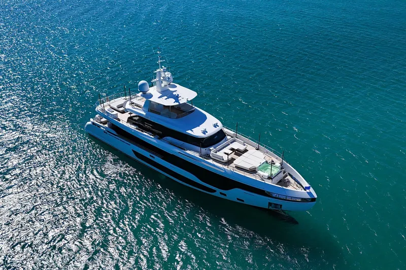  Yacht Photos Pics Luxurious 2025 Azimut Grande 36M yacht cruising on clear blue waters.