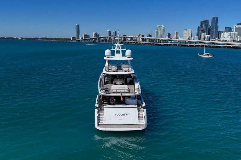  Yacht Photos Pics Azimut Grande 36M yacht cruising near city skyline, 2025 model.