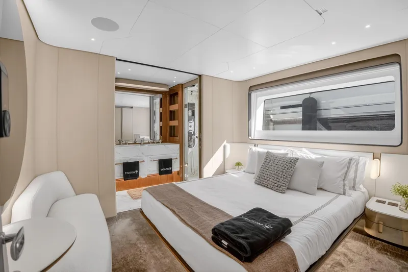  Yacht Photos Pics Luxurious bedroom interior of 2025 Azimut Grande 36M yacht with modern design and large window.