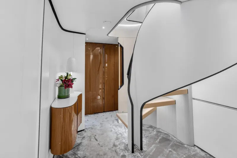  Yacht Photos Pics Luxurious interior of 2025 Azimut Grande 36M yacht with modern staircase and elegant decor.