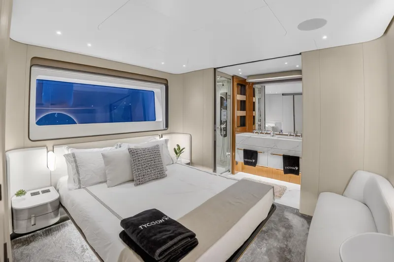  Yacht Photos Pics Luxurious bedroom interior of 2025 Azimut Grande 36M yacht with modern design and ensuite bathroom.