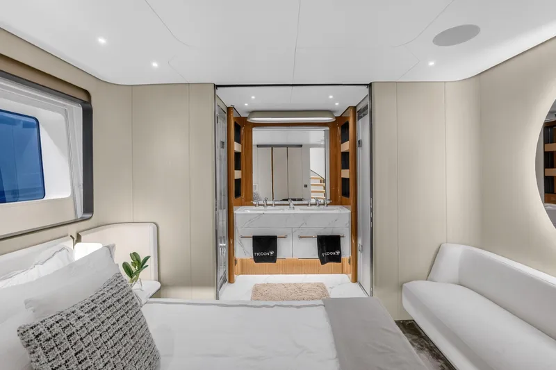  Yacht Photos Pics Luxurious interior of 2025 Azimut Grande 36M yacht with elegant bedroom and ensuite bathroom.