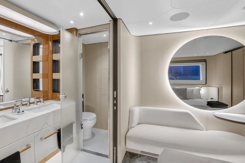  Yacht Photos Pics Luxurious interior of 2025 Azimut Grande 36M yacht featuring modern bathroom and elegant seating area.