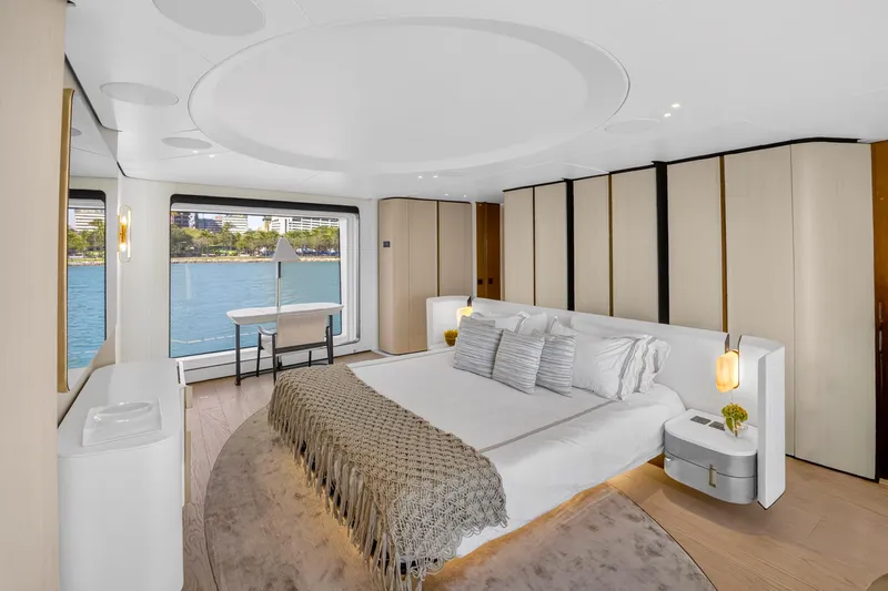  Yacht Photos Pics Luxurious bedroom interior of 2025 Azimut Grande 36M yacht with waterfront view.