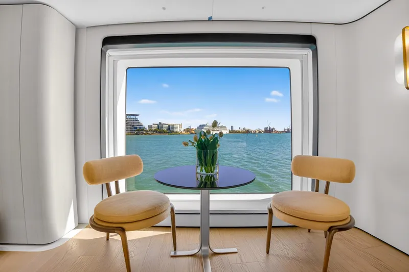  Yacht Photos Pics Interior of 2025 Azimut Grande 36M yacht with waterfront view through large window.