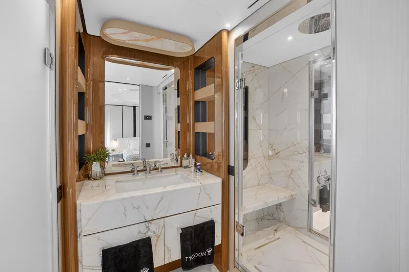  Yacht Photos Pics Luxurious bathroom in 2025 Azimut Grande 36M yacht with marble finishes and modern fixtures.
