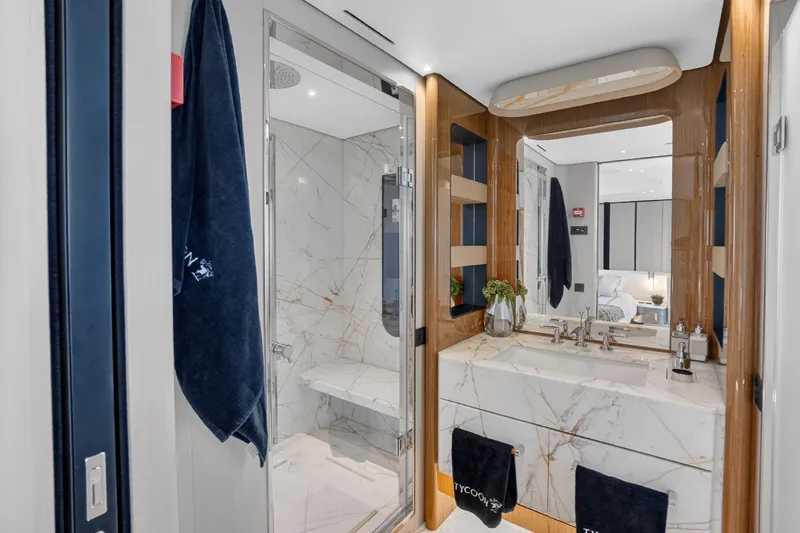  Yacht Photos Pics Luxurious bathroom on 2025 Azimut Grande 36M yacht with marble finishes and modern fixtures.
