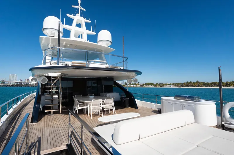  Yacht Photos Pics Luxurious 2025 Azimut Grande 36M yacht deck with seating and dining area, ocean view.