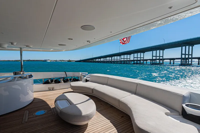  Yacht Photos Pics Luxurious Azimut Grande 36M yacht deck with ocean view, bridge, and American flag, 2025 model.