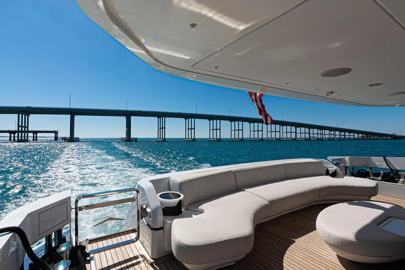  Yacht Photos Pics Luxurious Azimut Grande 36M yacht cruising under a sunny bridge, 2025 model.