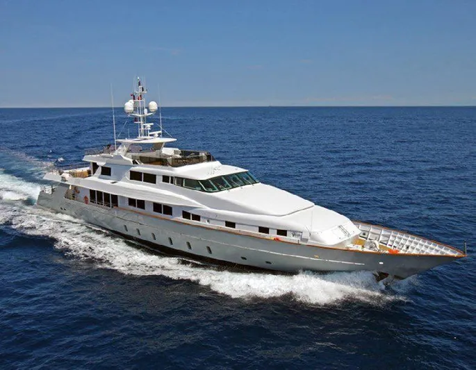  Yacht Photos Pics Luxury Benetti 50 CUSTOM yacht cruising on open sea, 1987 model.