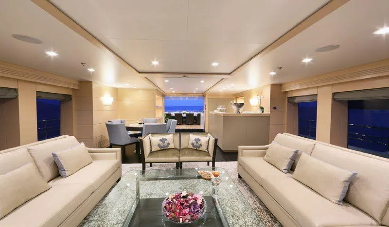  Yacht Photos Pics Luxurious interior of 1987 Benetti 50 CUSTOM yacht with elegant seating and modern decor.