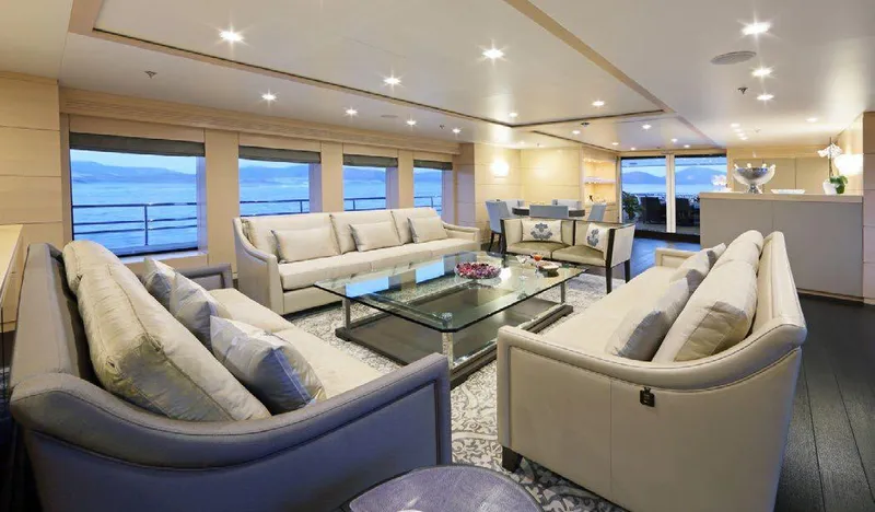  Yacht Photos Pics Luxurious interior of 1987 Benetti 50 CUSTOM yacht with elegant seating and ocean views.
