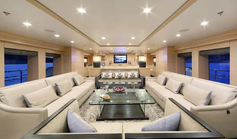  Yacht Photos Pics Luxurious interior of 1987 Benetti 50 CUSTOM yacht with elegant seating and modern decor.