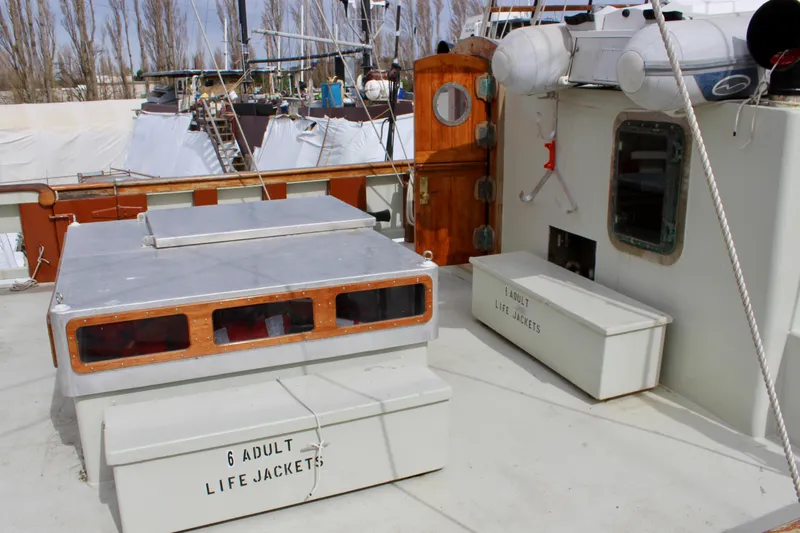 Hawaiian Chieftain Yacht Photos Pics 1988 Custom Lahaina Welding Co. Square Topsail Ketch deck with life jacket storage.