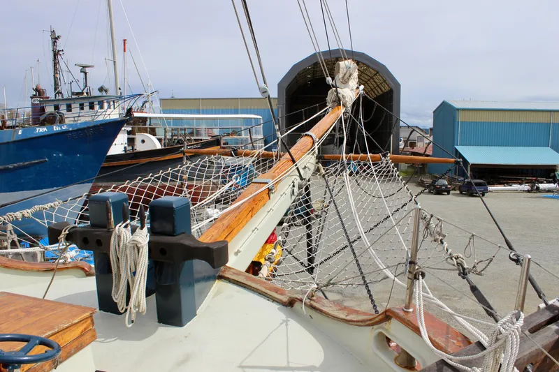 Hawaiian Chieftain Yacht Photos Pics Square topsail ketch in shipyard, Lahaina Welding Co., 1988, with rigging and maritime equipment.