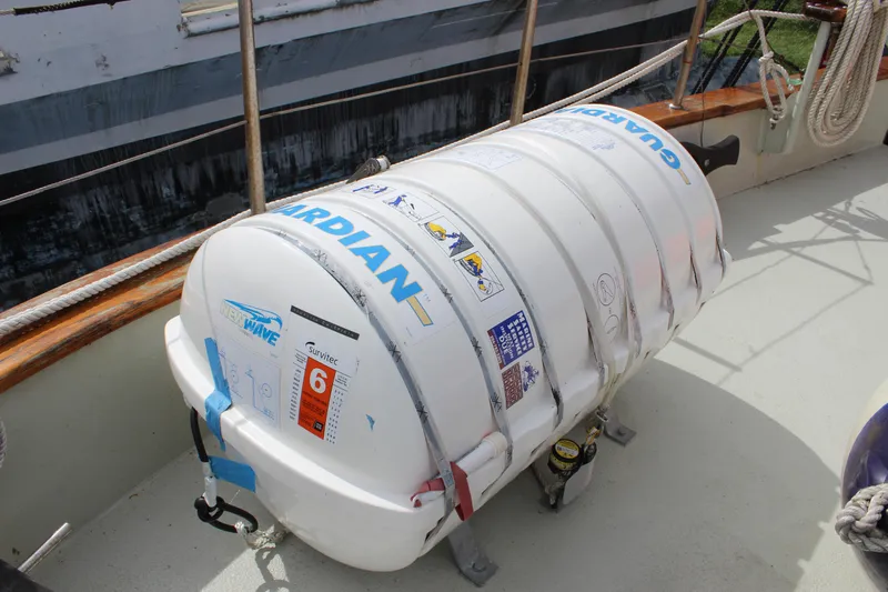 Hawaiian Chieftain Yacht Photos Pics Liferaft on deck of 1988 Custom Lahaina Welding Co. Square Topsail Ketch.