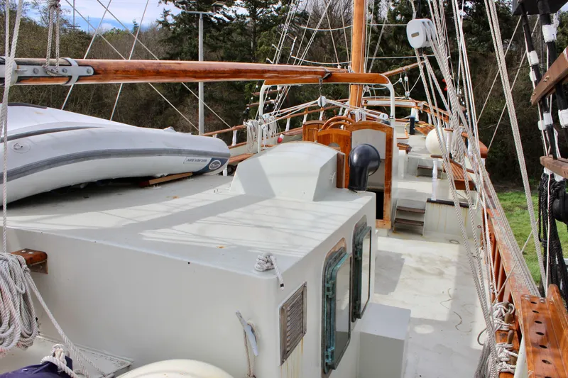 Hawaiian Chieftain Yacht Photos Pics 1988 Custom Lahaina Welding Co. Square Topsail Ketch deck with rigging and dinghy.
