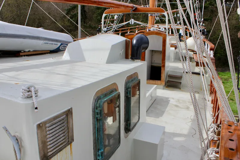 Hawaiian Chieftain Yacht Photos Pics 1988 Custom Lahaina Welding Co. Square Topsail Ketch deck with rigging and lifeboat.