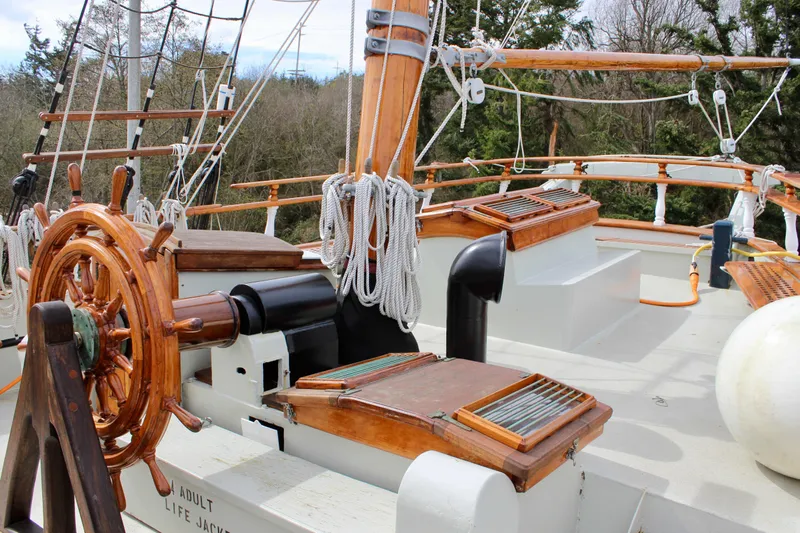 Hawaiian Chieftain Yacht Photos Pics Wooden helm and rigging on 1988 Lahaina Welding Co. Square Topsail Ketch deck.