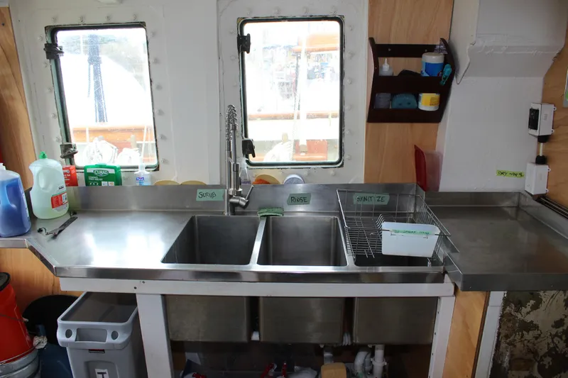 Hawaiian Chieftain Yacht Photos Pics Stainless steel kitchen sink on 1988 Lahaina Welding Co. Square Topsail Ketch boat.