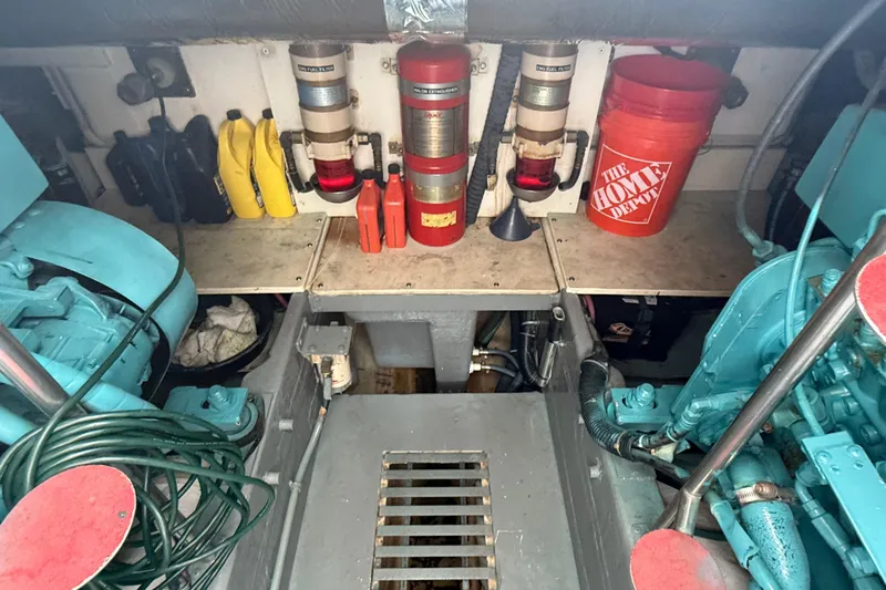  Yacht Photos Pics Engine room of a 1999 Tiara Yachts 4000 Express with equipment and tools.