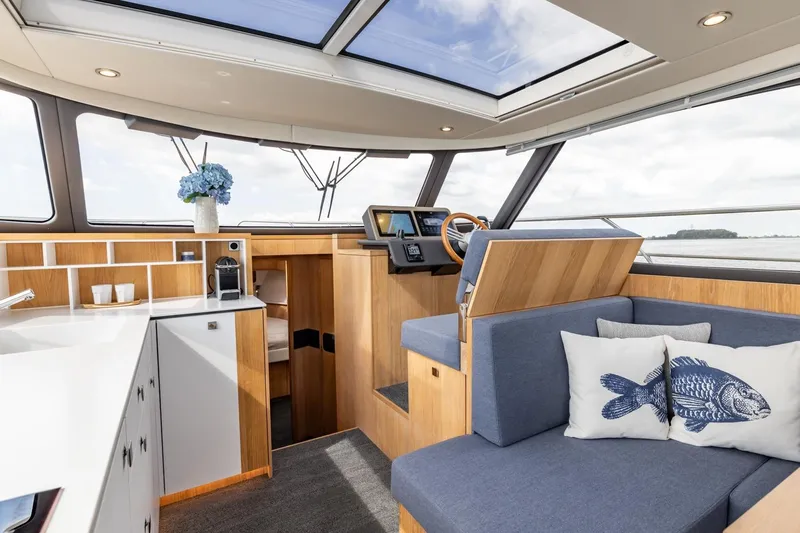 Yacht Photos Pics Luxurious interior of 2024 Vripack 42 Open Kuip yacht with modern design and skylight.