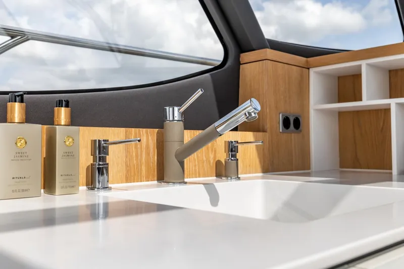  Yacht Photos Pics Luxurious Vripack 42 yacht interior with modern sink and premium toiletries, 2024 model.