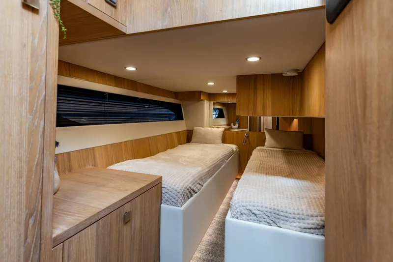  Yacht Photos Pics Luxurious cabin interior of 2024 Vripack 42 Open Kuip yacht with twin beds.