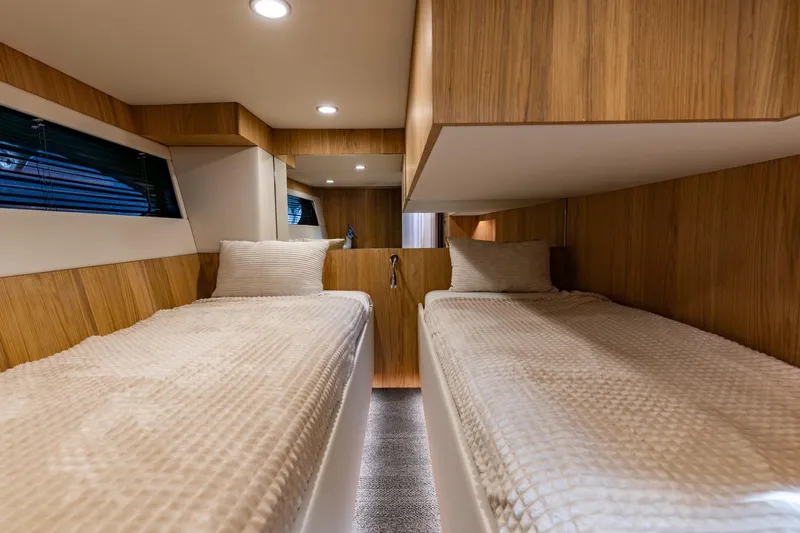  Yacht Photos Pics Luxurious twin cabin interior of 2024 Vripack 42 Open Kuip yacht.