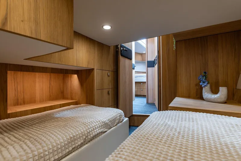  Yacht Photos Pics Luxurious cabin interior of 2024 Vripack 42 Open Kuip yacht, featuring elegant wood finishes.