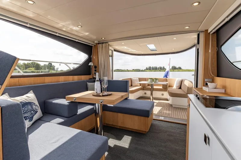  Yacht Photos Pics Luxurious interior of 2024 Vripack 42 Open Kuip yacht with elegant seating and scenic views.