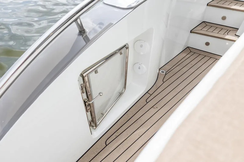  Yacht Photos Pics 2024 Vripack 42 Open Kuip yacht deck with sleek design and wooden flooring.