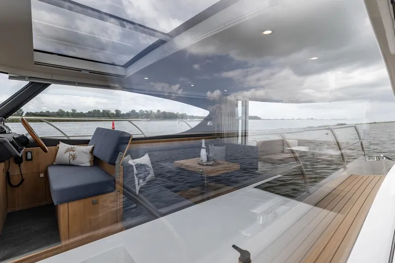  Yacht Photos Pics Luxurious Vripack 42 Open Kuip yacht interior with panoramic water views, 2024 model.