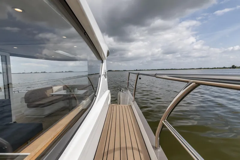  Yacht Photos Pics 2024 Vripack 42 Open Kuip yacht with stabilizers, featuring sleek deck and scenic water view.